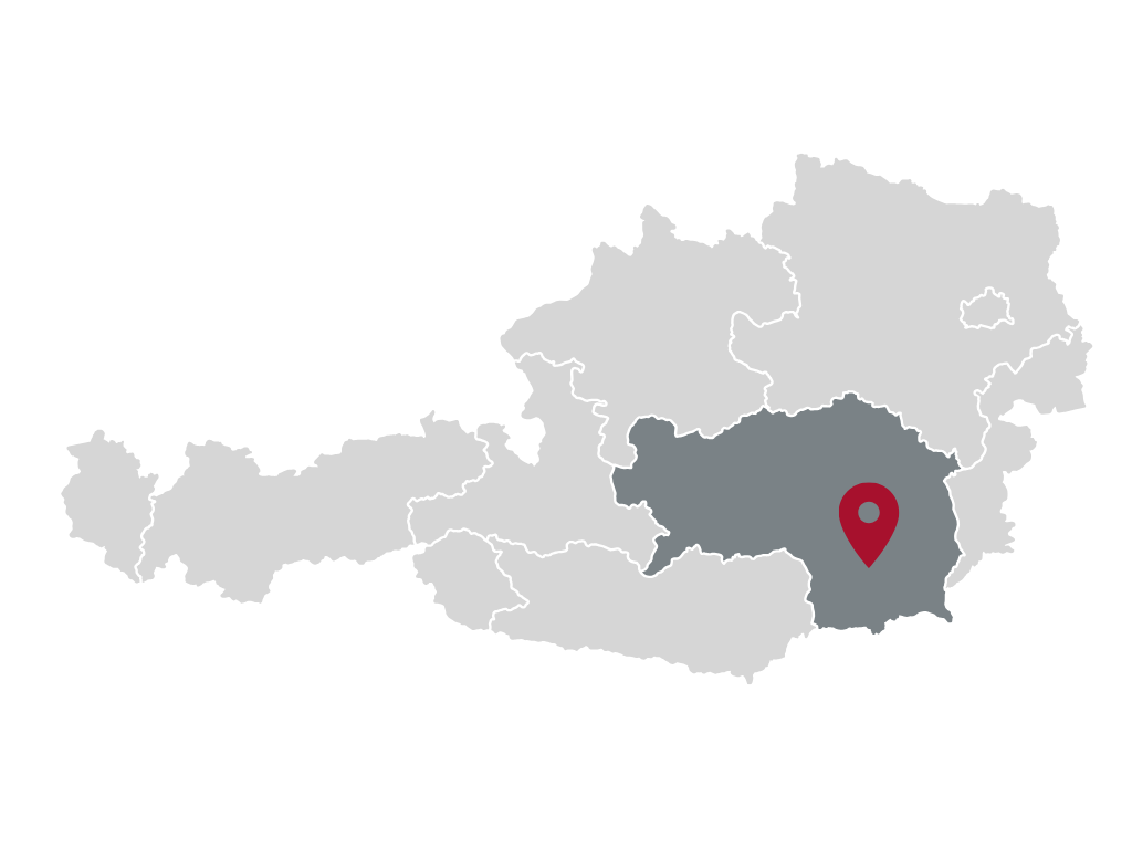 Österreichkarte, das Bundesland Steiermark ist dunkelgrau hervorgehoben, ein roter Pin zeigt auf Graz.