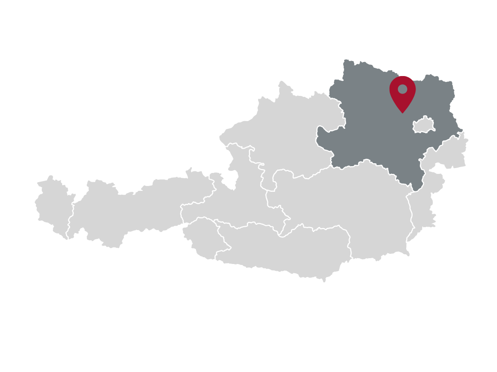Österreichkarte, das Bundesland Niederösterreich ist dunkelgrau hervorgehoben, ein roter Pin zeigt auf Tulln